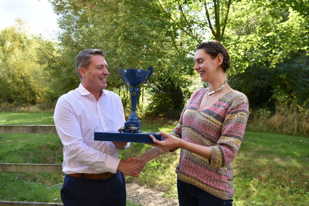 eve Networks Managing Director Steve Barclay presents Rhiannon Williams Tarling with the Level Up Cup